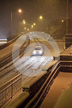 Heavy snow fall with passing traffic