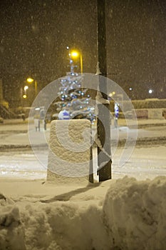 Heavy snow fall on a sign