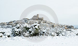 Heavy snowfall in the surroundings of medieval village