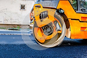 Heavy Tandem Vibration roller compactor at asphalt