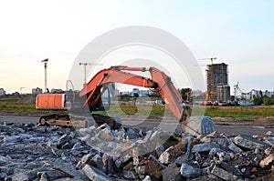 Heavy tracked excavator at a construction site