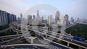 Heavy traffic on highway interchange,Aerial View of Shanghai Skyline.