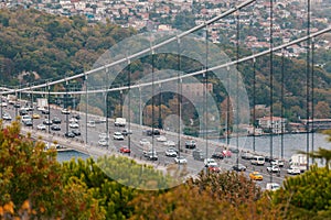 Heavy traffic on Istanbul Bosphorus Bridge connecting Europe and Asia photo