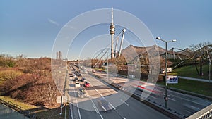 Heavy traffic on Munich street in the area of the Olympic Park