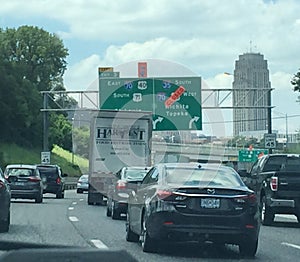 Heavy traffic near Downtown Kansas City, Missouri with signage