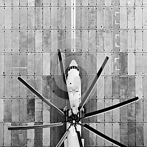 Heavy transport helicopter aerial view. loading equipment on the runway