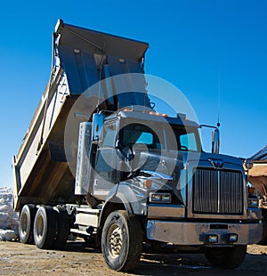 Heavy transport truck parked while waiting for work