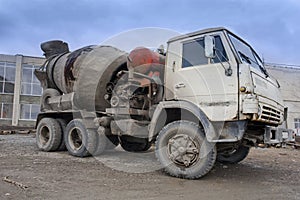 Heavy truck, concrete mixer in the workmanship photo
