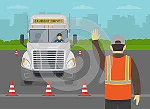 Heavy vehicle driving practice test with red cones. Student driver stopping at stop line. Instructor shows stop gesture.