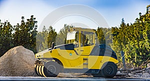 Heavy Vibration roller at asphalt pavement works Asphalt paver road repair Asphalt