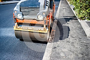 Heavy Vibration roller compactor at asphalt pavement works