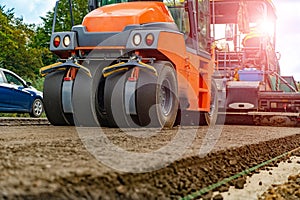 Heavy Vibration roller compactor at asphalt pavement works for road and highway construction