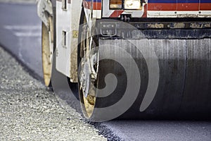 Heavy Vibration roller compactor at asphalt pavement works for road and highway construction