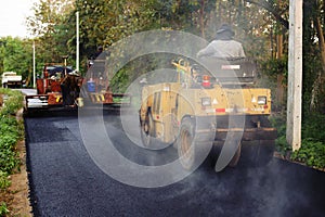 Heavy Vibration roller compactor at asphalt pavement works for road repairing