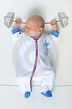 Heavyweight champion baby in sports costume