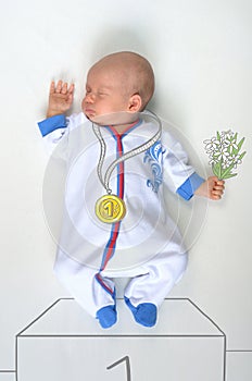 Heavyweight champion baby in sports costume photo