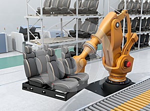 Heavyweight robotic arm carrying car seats in car assembly production line photo