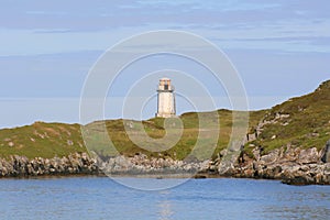 White tower beacon on Scottish island photo