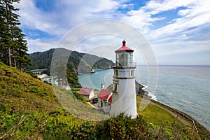 Heceta Head Lighthouse on a cliff in Oregon overlooking the Pacific Ocean