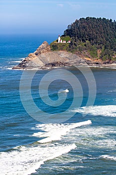 Heceta Head Lighthouse between Yachats and Florence Oregon on the Pacific Ocean in August, vertical