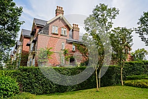 Hedged European-style villas in sunny autumn