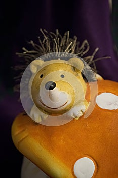 Hedgehog and fly agaric