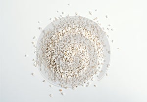 Heep of Expanded perlite on white background