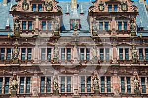 Heidelberg architecture, historic windows and statues