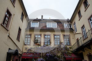 Heidelberg city Germany. Traditional German building architecture with many big window, under view