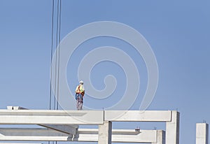 Height worker on building skeleton