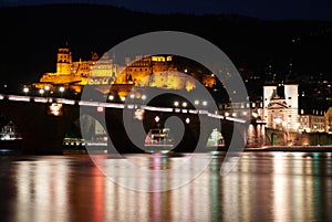 Heilderberg, Germany, 02082020: Night view of the castle and the old bridge from the riverside.