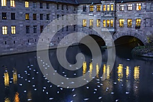 Heilig Geist Spital, a historical hospital on Pegnitz river in old town of Nuremberg, Bavaria, Germany. November 2014