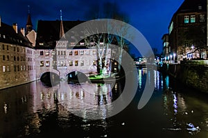 The Heilig-Geist-Spital at night in Nuremberg, Germany.