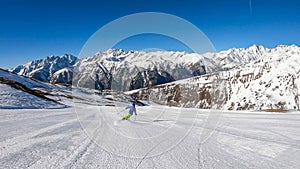 Heiligenblut - A skier going down a perfectly roomed slope