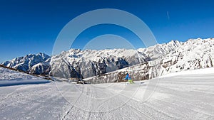 Heiligenblut - A skier going down a perfectly roomed slope