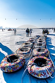 Heilongjiang Harbin China -  DEC, 29 2018 : In Winter river the turns into frozen, People can walk down and arrange activities on