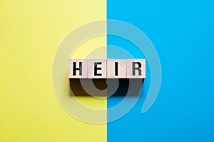 Heir word concept on cubes photo