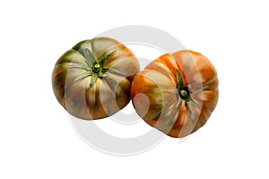 Heirloom tomato isolated on white background. Tomato clipping path