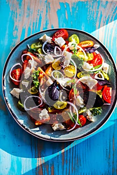 Heirloom tomatoes salad with cheese and basil