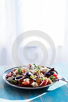 Heirloom tomatoes salad with cheese and basil