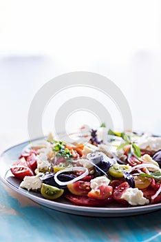 Heirloom tomatoes salad with cheese and basil