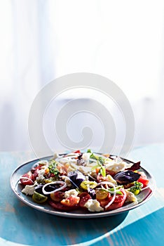 Heirloom tomatoes salad with cheese and basil