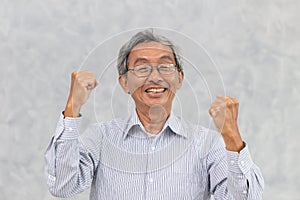 Helathy strong Chinese Asian elder happy smile with recovered from corona virus disease