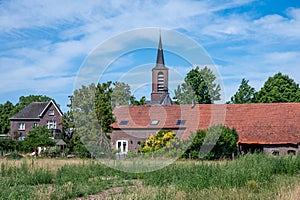 Helden, Limburg, The Netherlands - Landscape view over the green surroundings of the village and the church tower