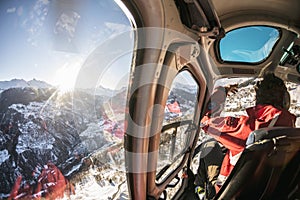 Heliboarding fly in a helicopter in Veysonnaz Les 4 Vallees Switzerland photo