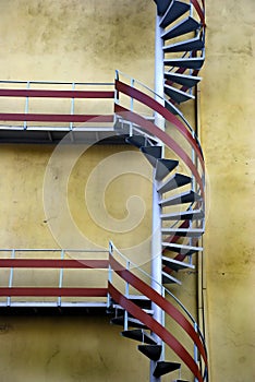 Helical Stairs on mildewy wall photo