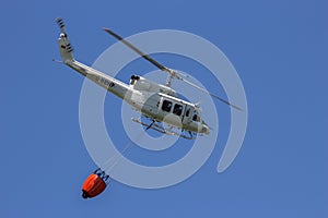 Helicopter bambi bucket fire fichting