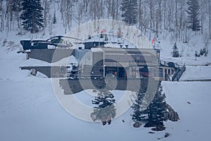 Helicopter base in the snowy mountains of Utah for heli-skiing, USA