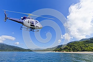 Helicopter and Beach