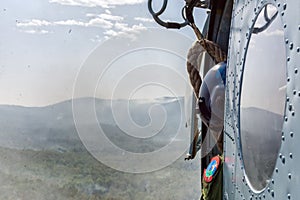 Helicopter and crew chief